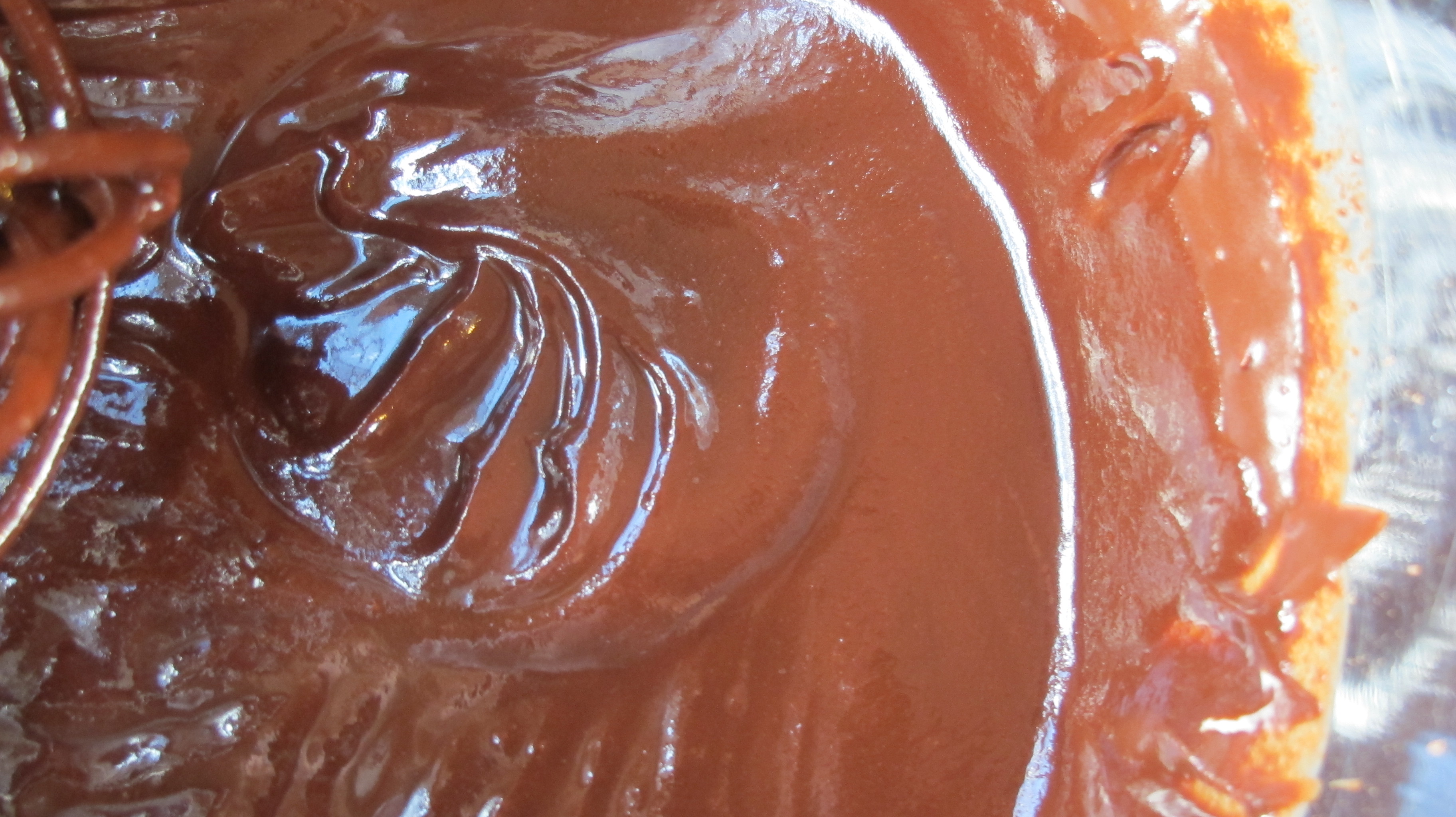 Whisk the heavy cream and chocolate until chocolate melts. 