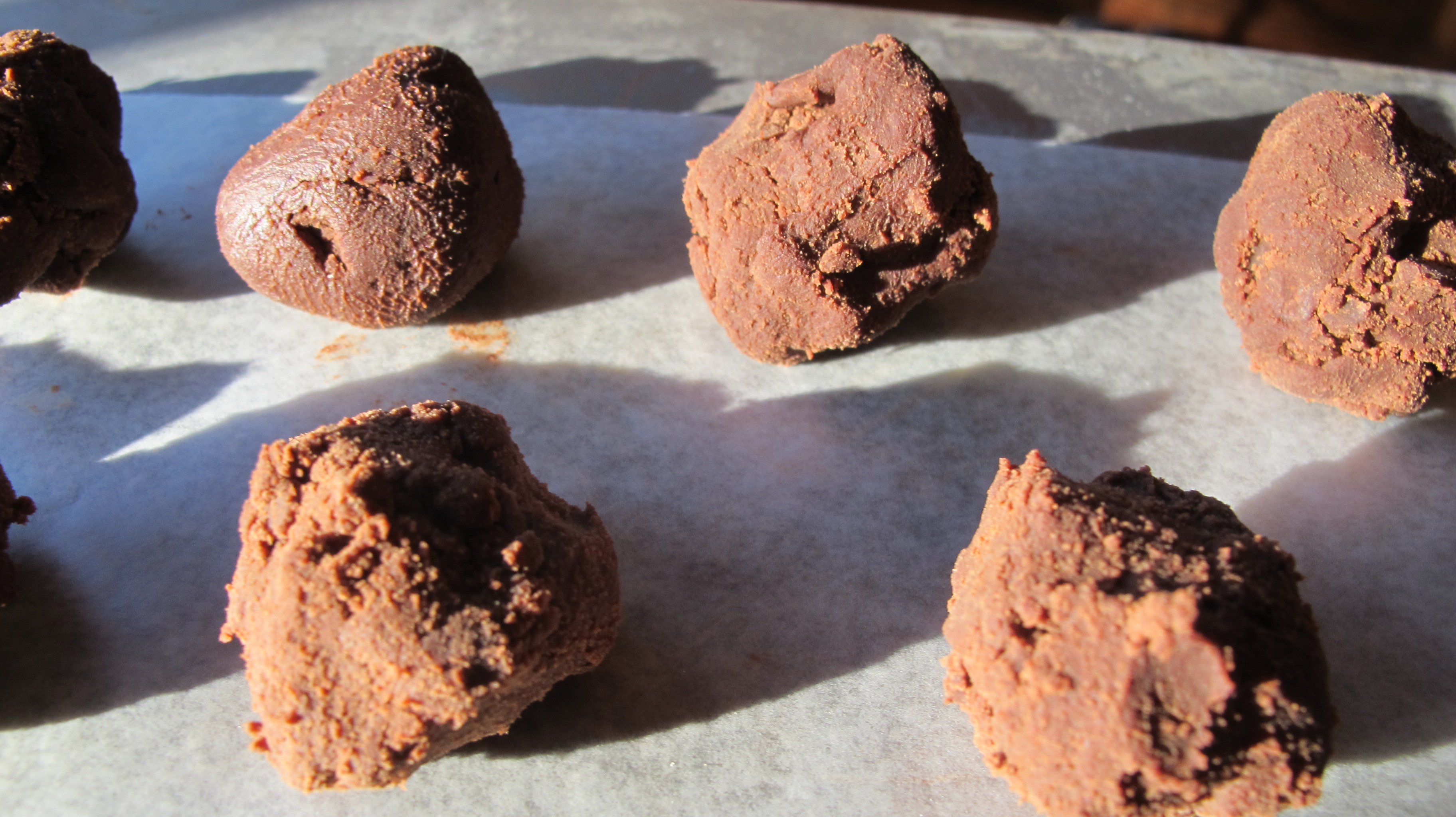 The ganache has been rolled to roughly look like a ball. 