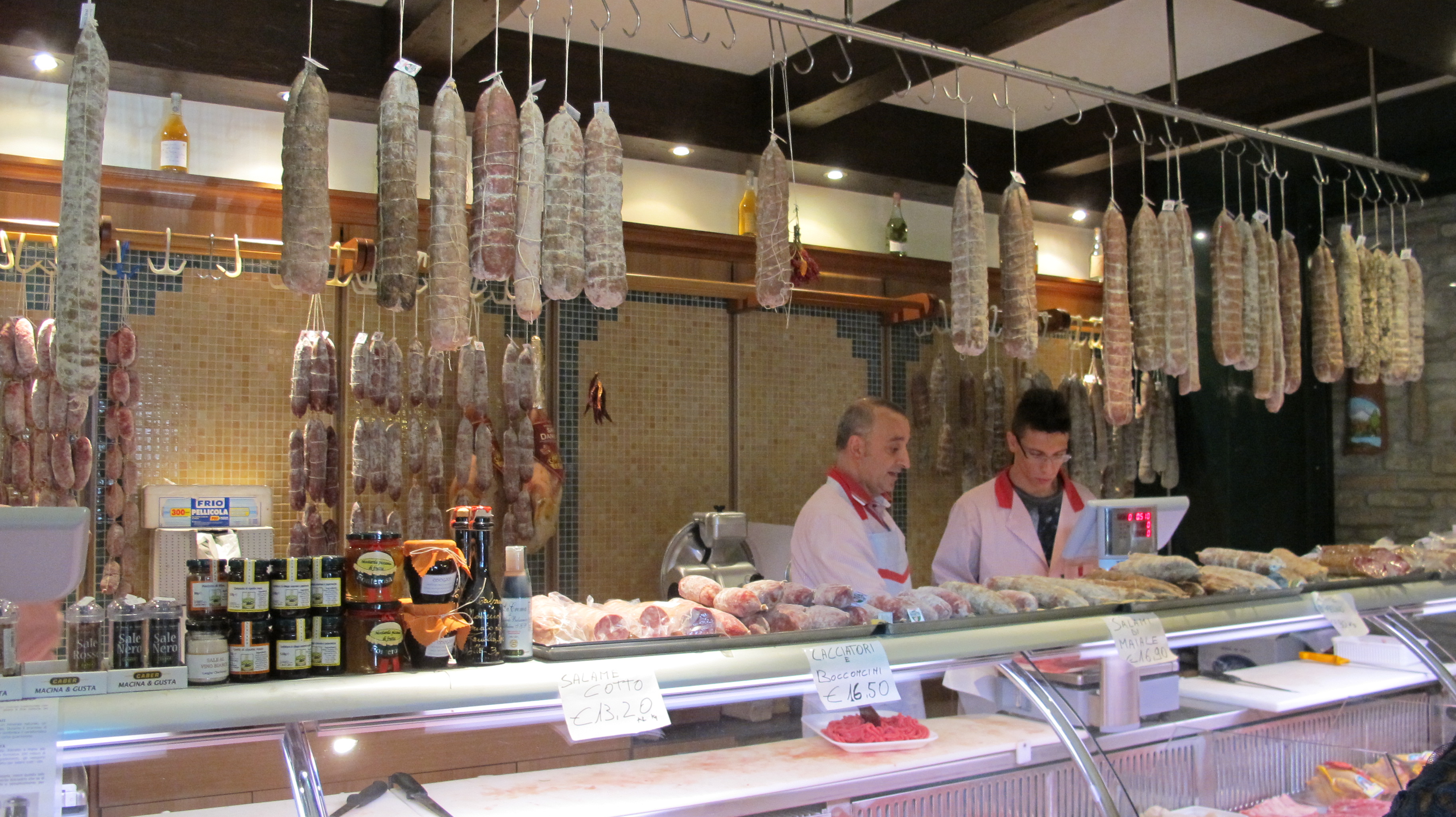 The kind Italian butcher with one of his young employees. 