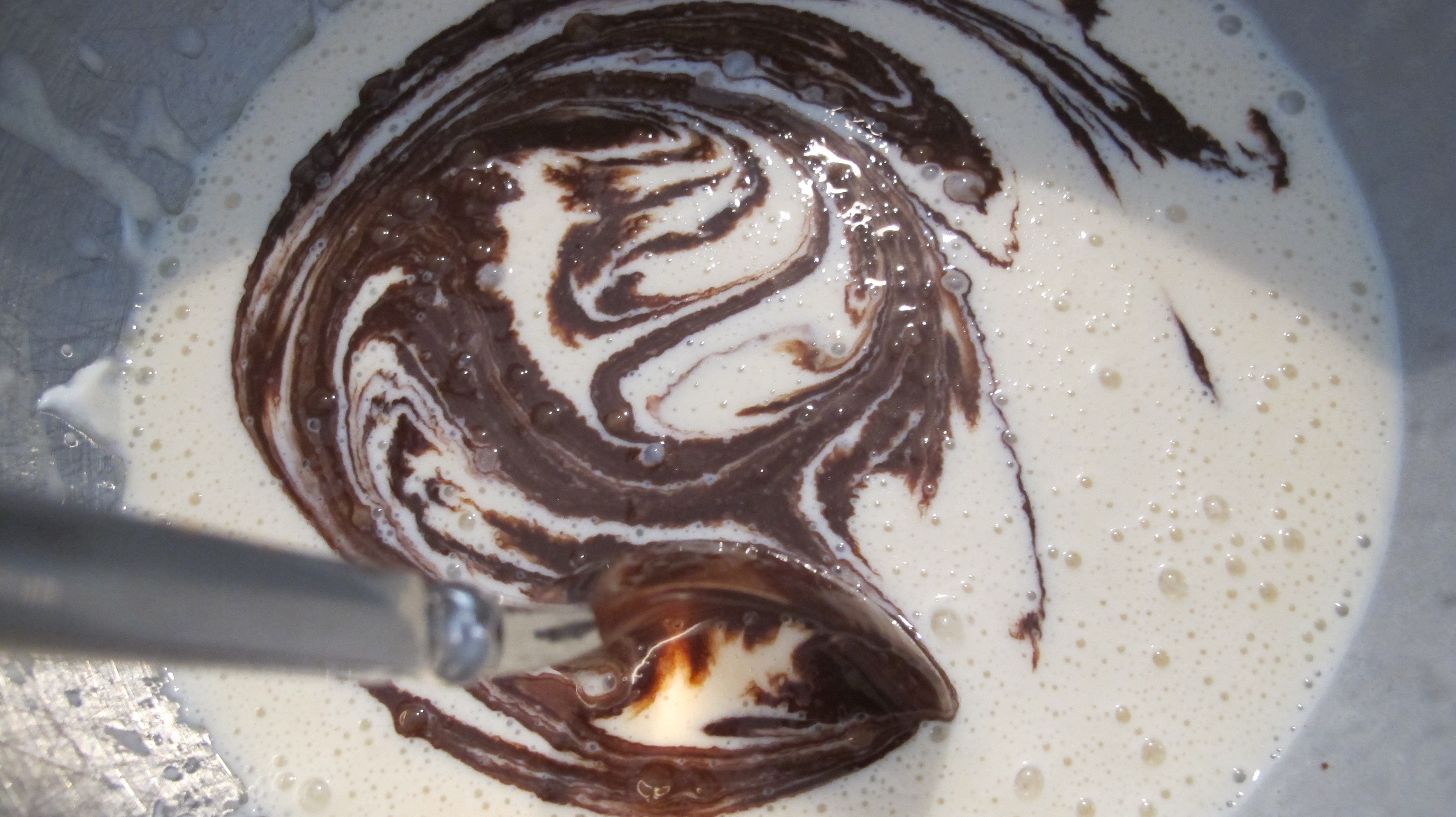 A beautiful swirl is created when mixing the cocoa into the milk-egg mixture. 