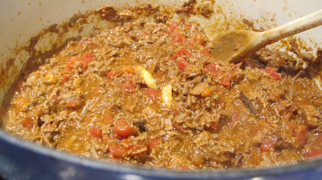 The meat and tomatoes have simmered together. 