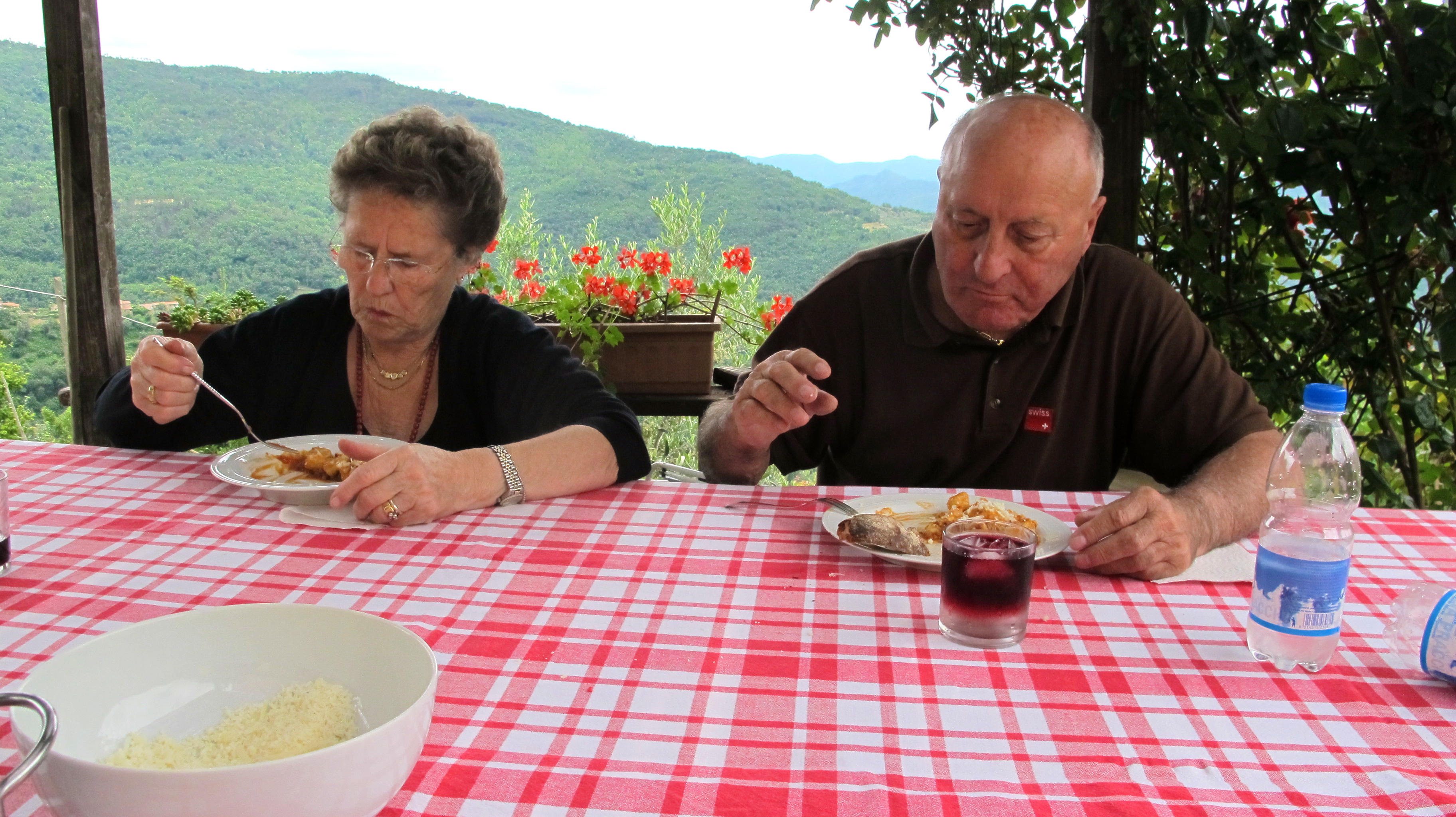 Nonna and Nonno enjoy their gnocchi. 