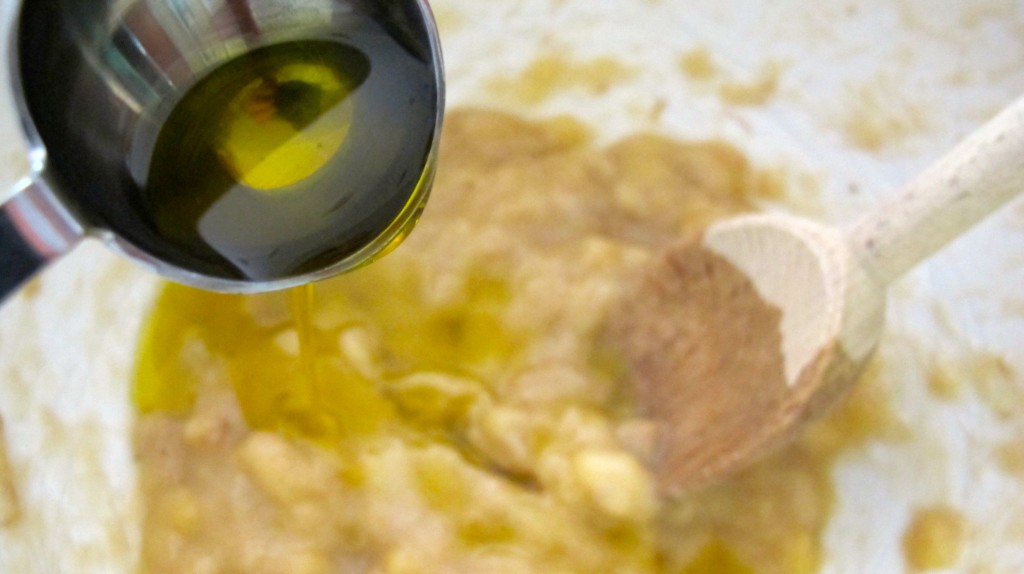 Add the olive oil into the wet batter. 