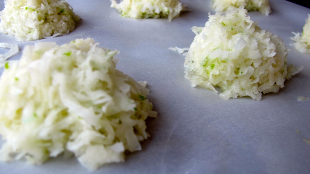 Use a small ice cream scoop to scoop the macaroons on a pan lined with parchment paper. 