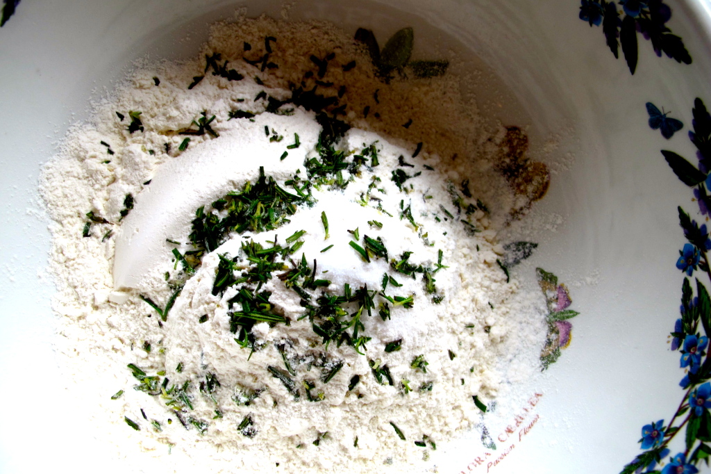 Mix the flour, salt, and rosemary together in a large bowl. 